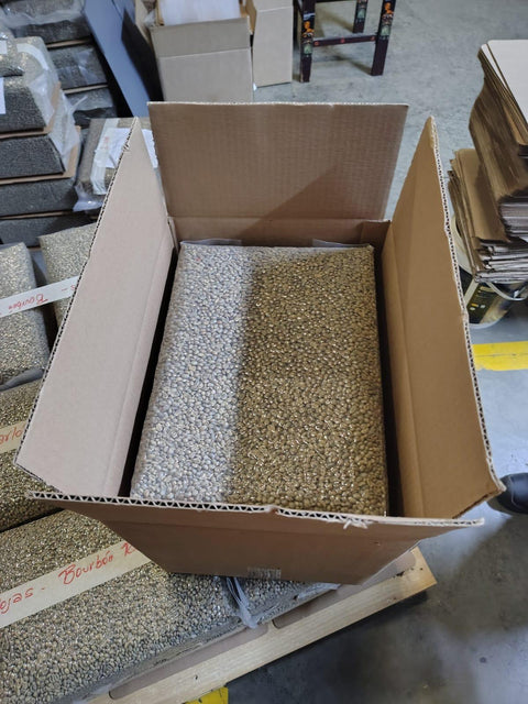 Example of green coffee vacuum packaging inside a cardboard box